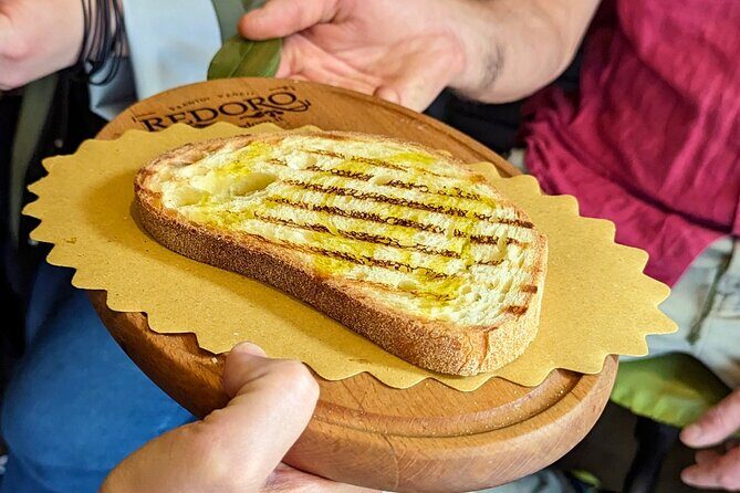 Guided Food Tour with Wine Tasting in Verona - Stop One: Olive Oil, Lake Garda Ingredients, and a Bruschetta Starter